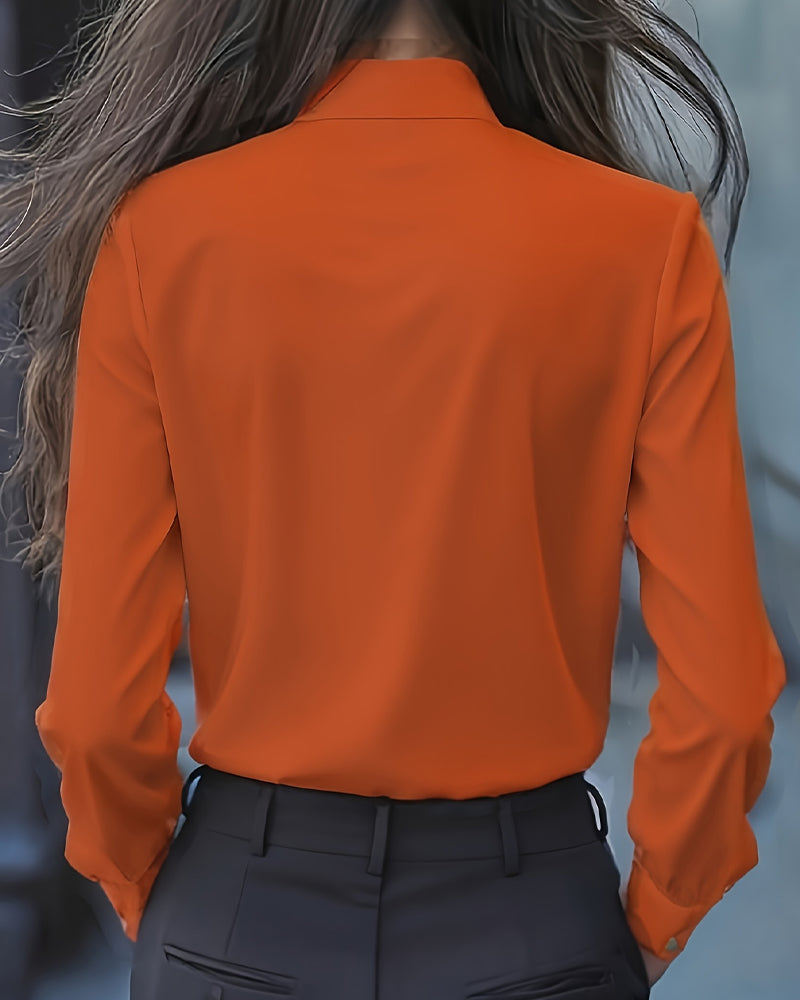 Long-Sleeved Blouse with Bow and Ruffles