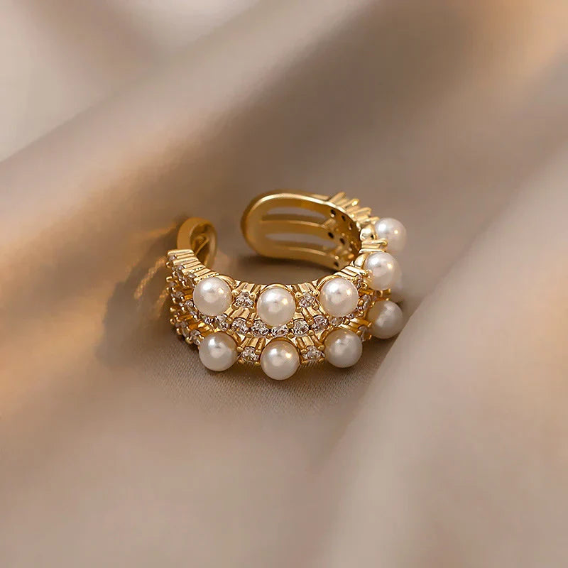 Adjustable double pearl ring in gold for an elegant style