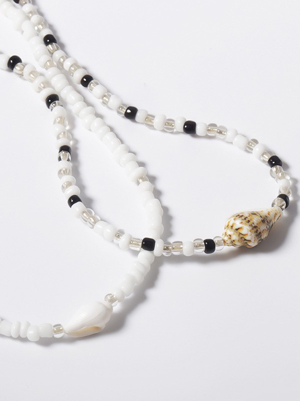 Carry the beauty of the sea with the elegant shell bracelet