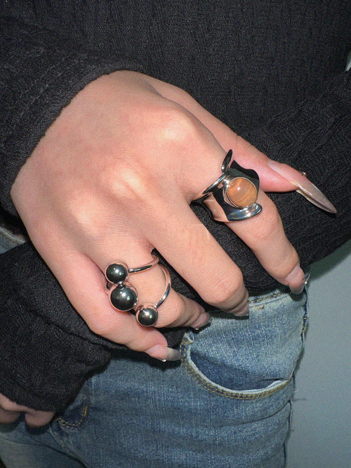 Stylish open silver bracelet with a single ball