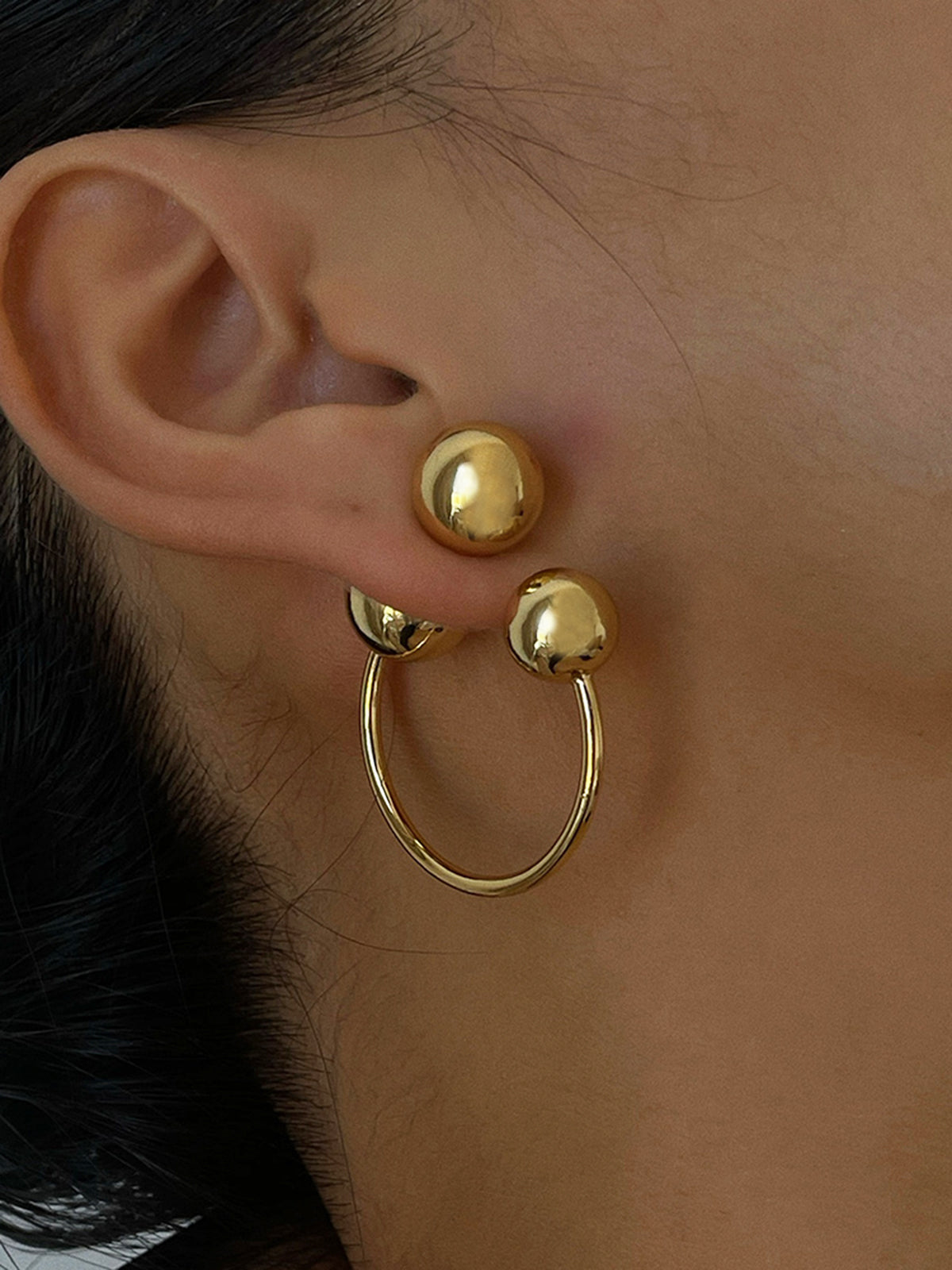 Elegant gold ball studs and earrings for a stylish look
