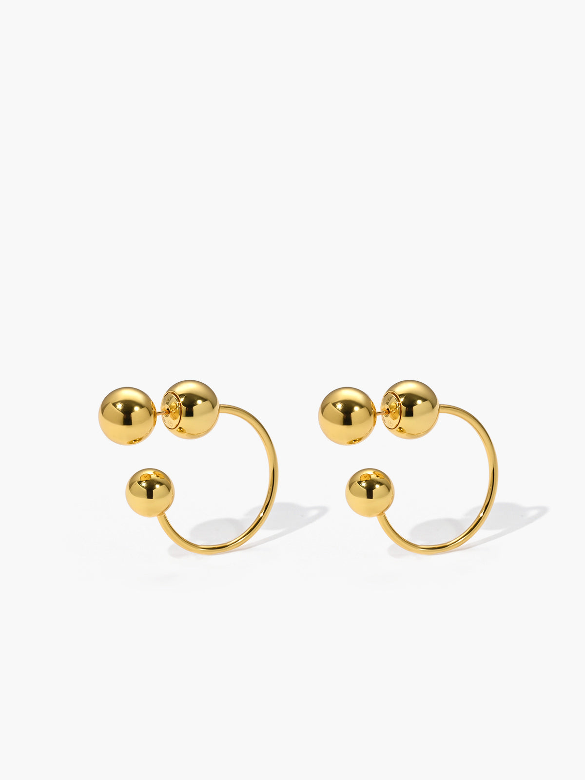 Elegant gold ball studs and earrings for a stylish look