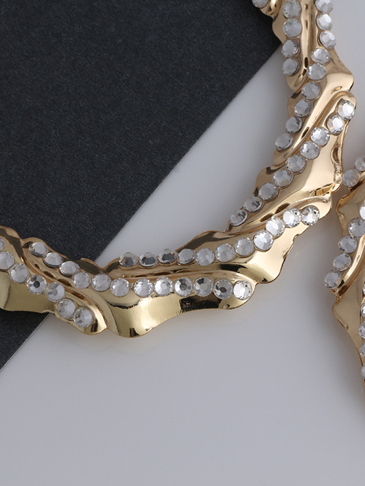 Large round bamboo earrings decorated with shiny rhinestones