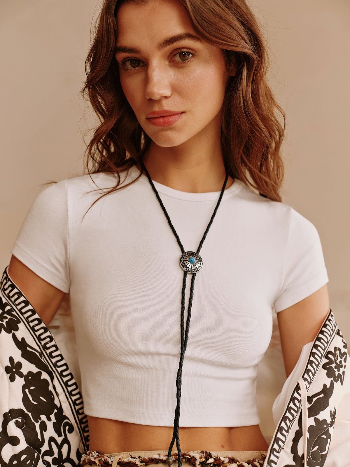 Vintage necklace with fleur-de-lis pendant in refined turquoise