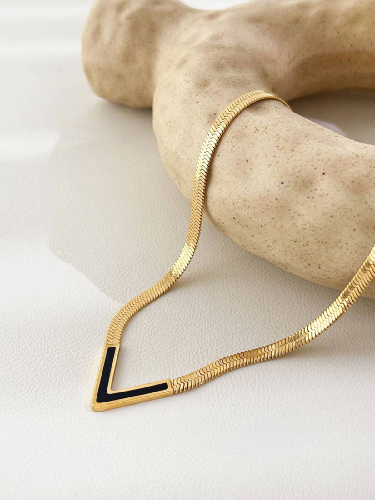 Luxury Gold V Necklace with Black Enamel – Elegant & Minimalistic Design