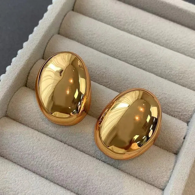 Oval Earrings with Gold, Rhodium, and Silver Plated Finish