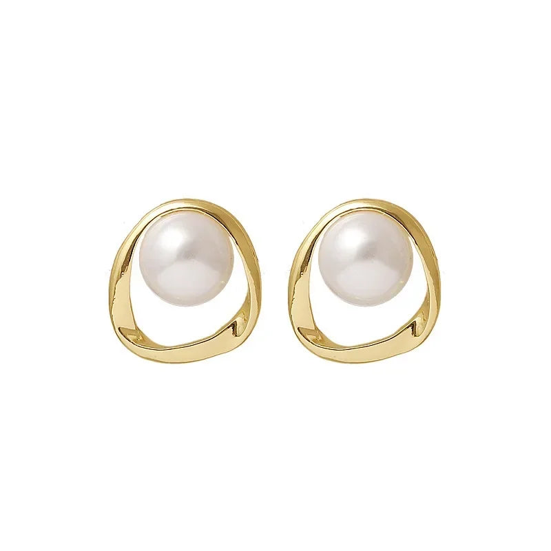 Captured Pearl Earrings in Gold Bezel
