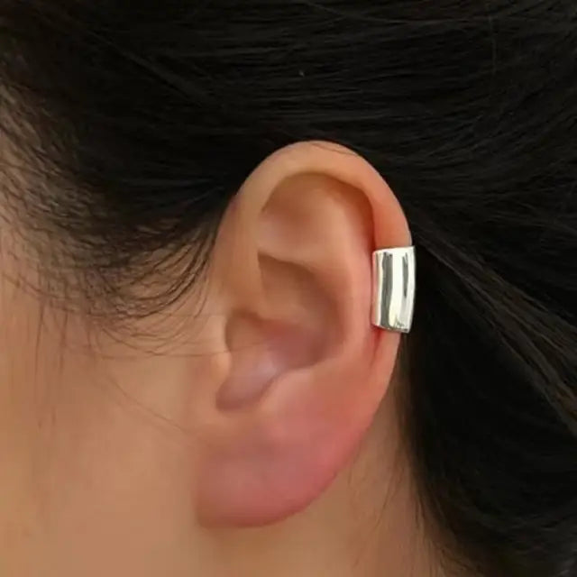 Cylindrical ear stud in tube form without piercing required
