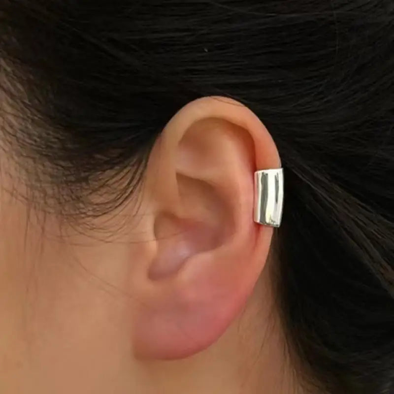 Cylindrical ear stud in tube form without piercing required