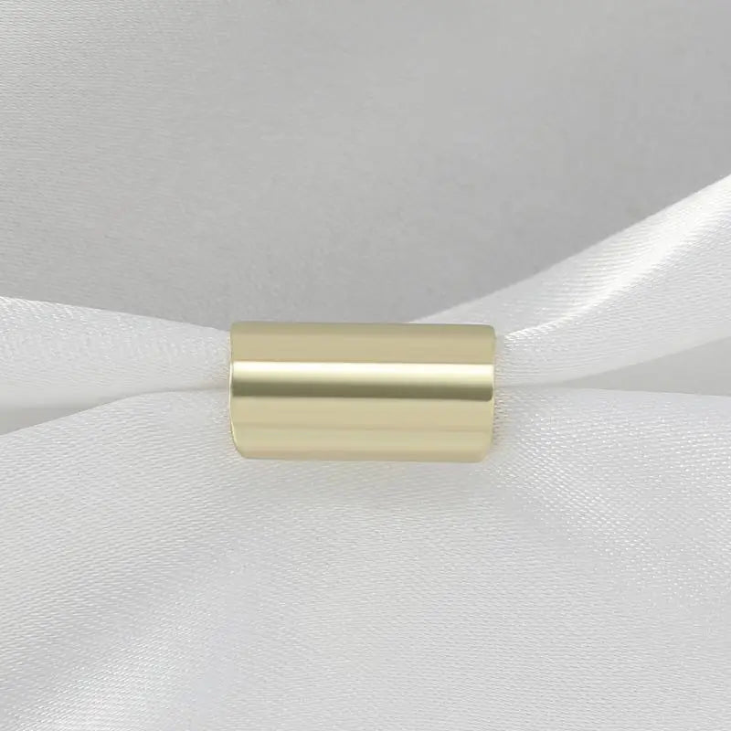 Cylindrical ear stud in tube form without piercing required