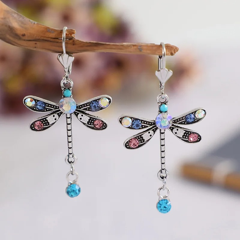 Stylish Silver Dragonfly Earrings with Elegant Cut