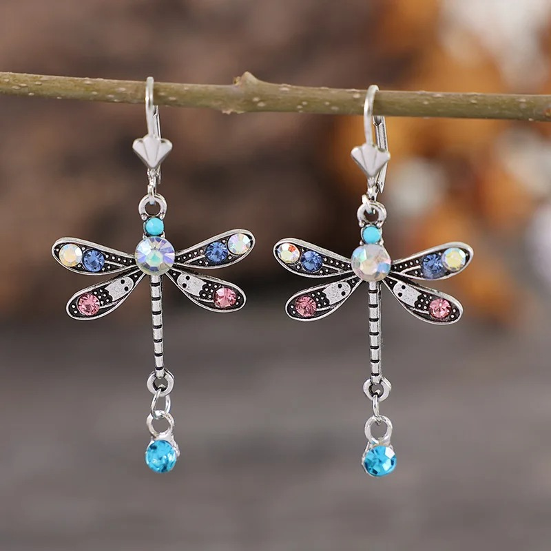 Stylish Silver Dragonfly Earrings with Elegant Cut