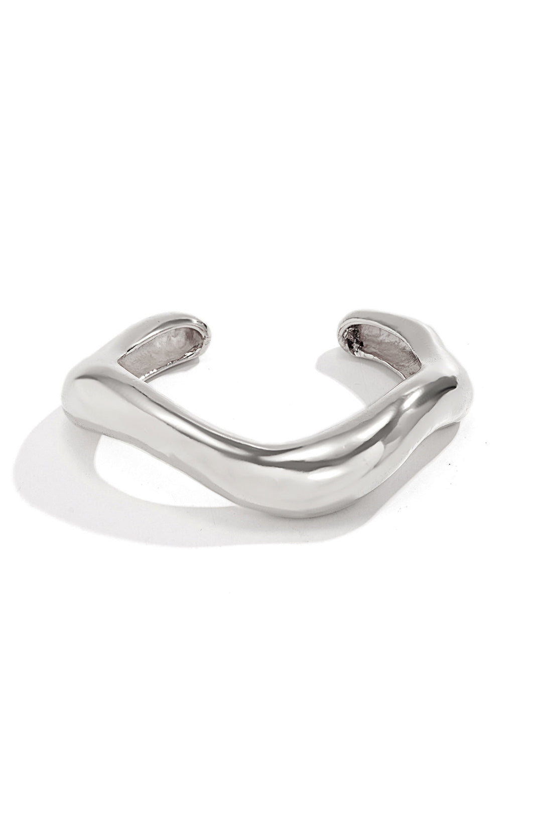 Unique asymmetrical bracelet made of metal material for a stylish look