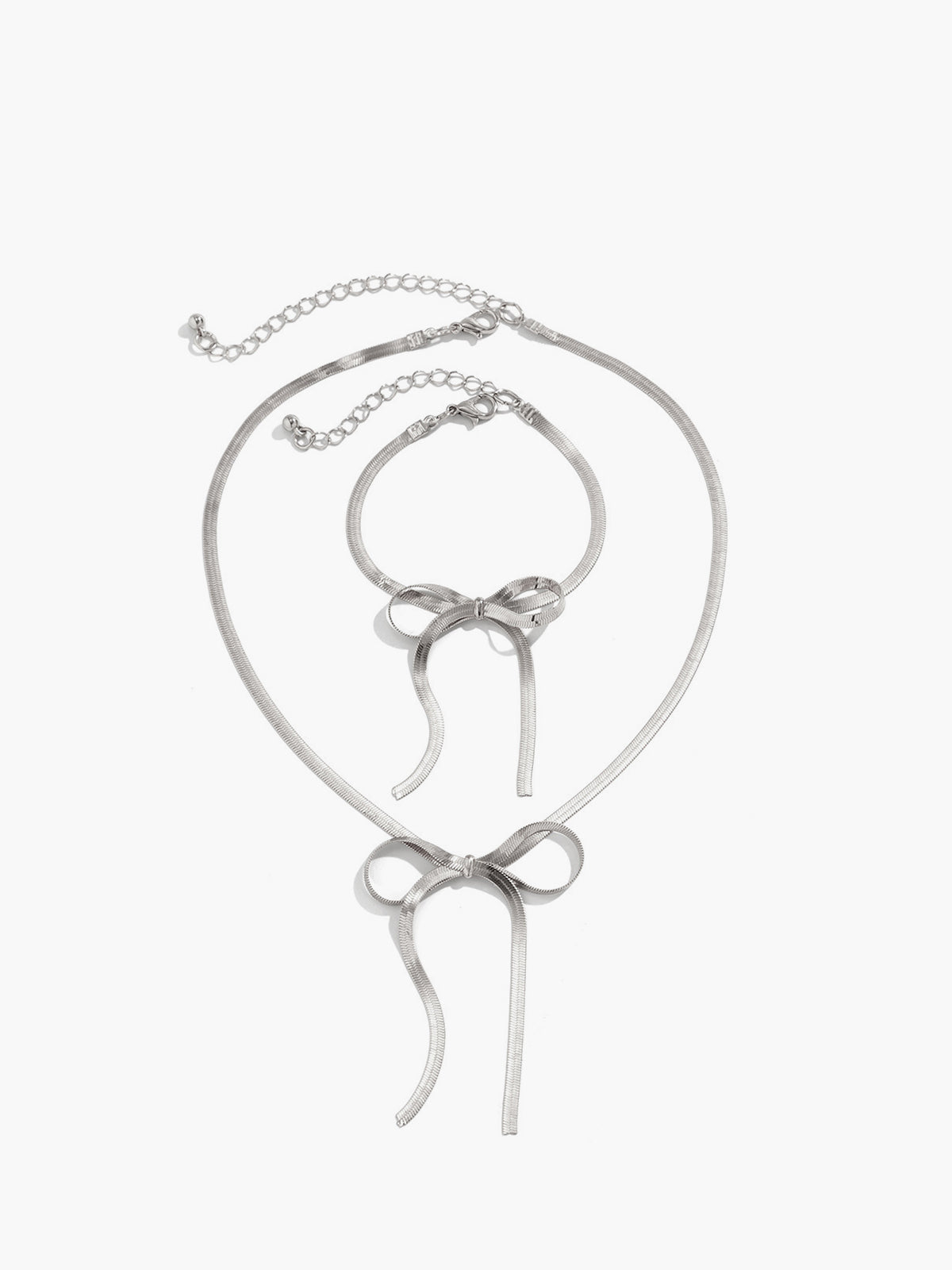 Complete your style with the elegant bow and tassels necklace and bracelet set