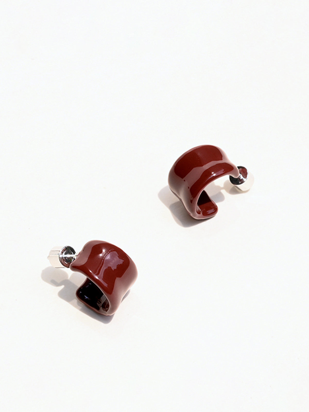 Original textured hoop earrings in the shape of a C