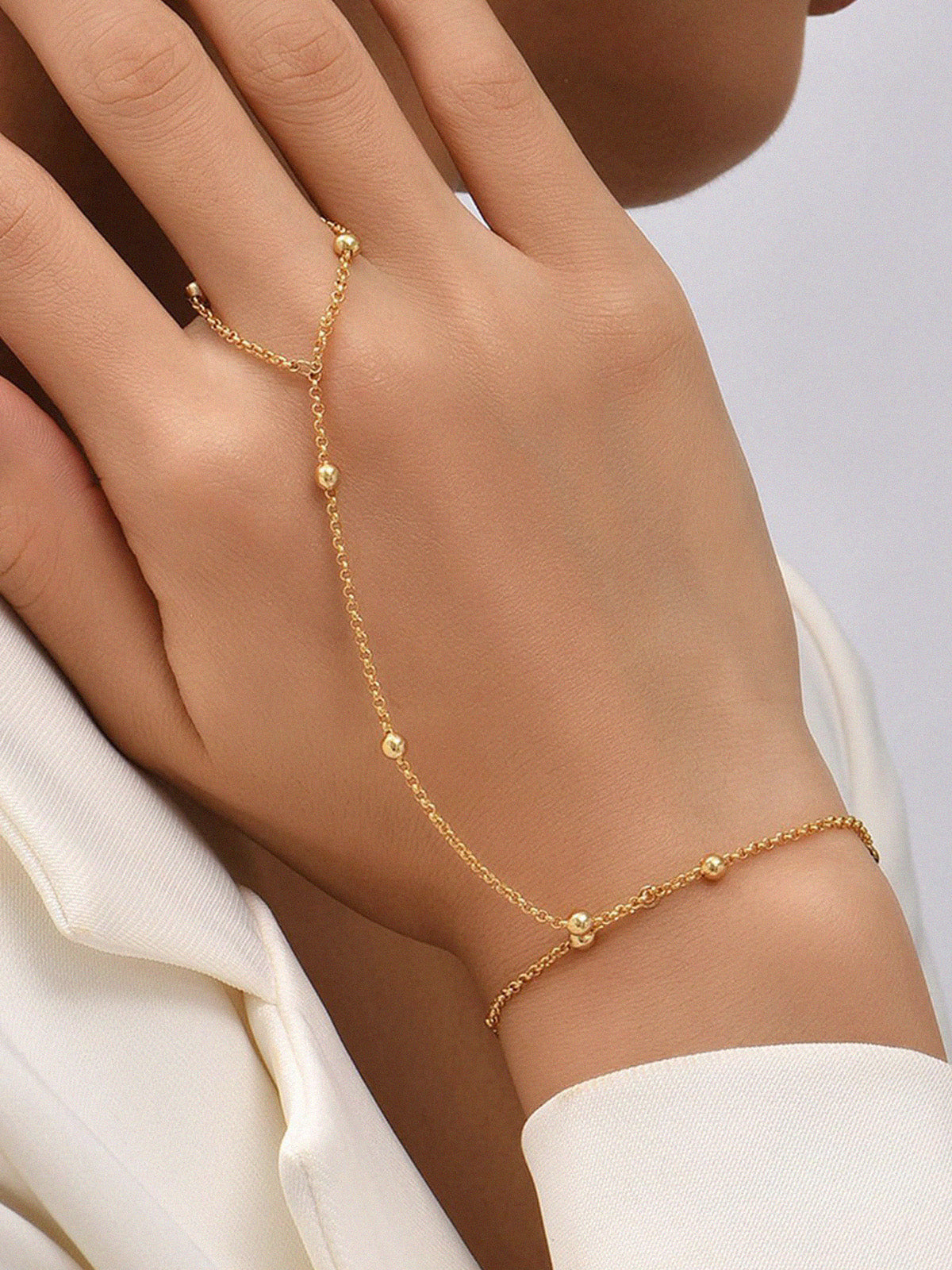 Golden Hand Chain for Women – Elegant Ring Bracelet with Fine Beads