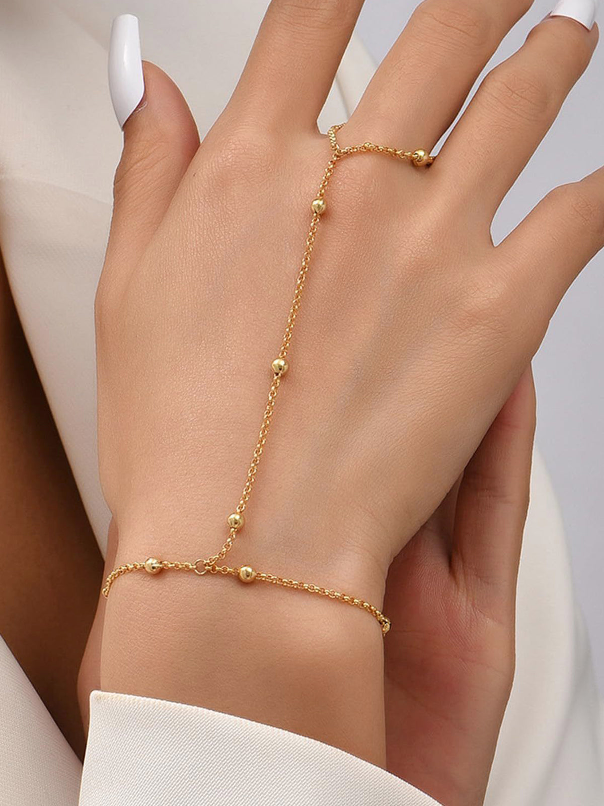 Golden Hand Chain for Women – Elegant Ring Bracelet with Fine Beads