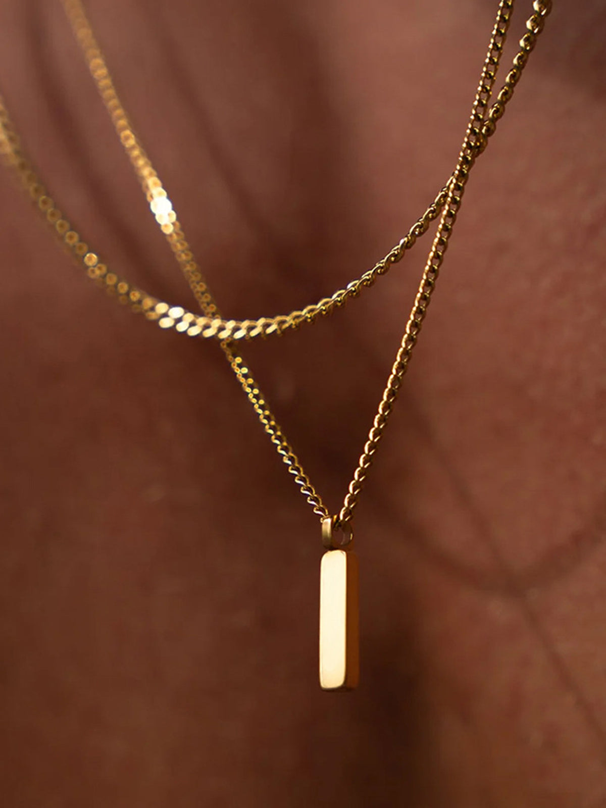 Funny gold striped pendant necklace