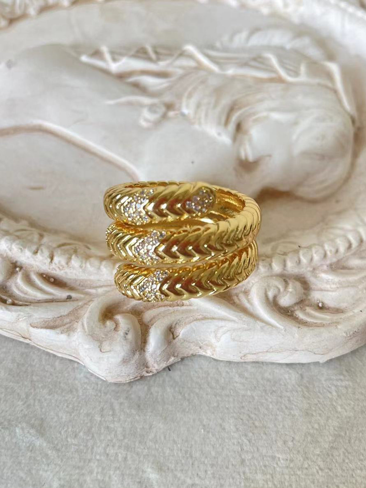 Ring and spiral of a snake with triple layer