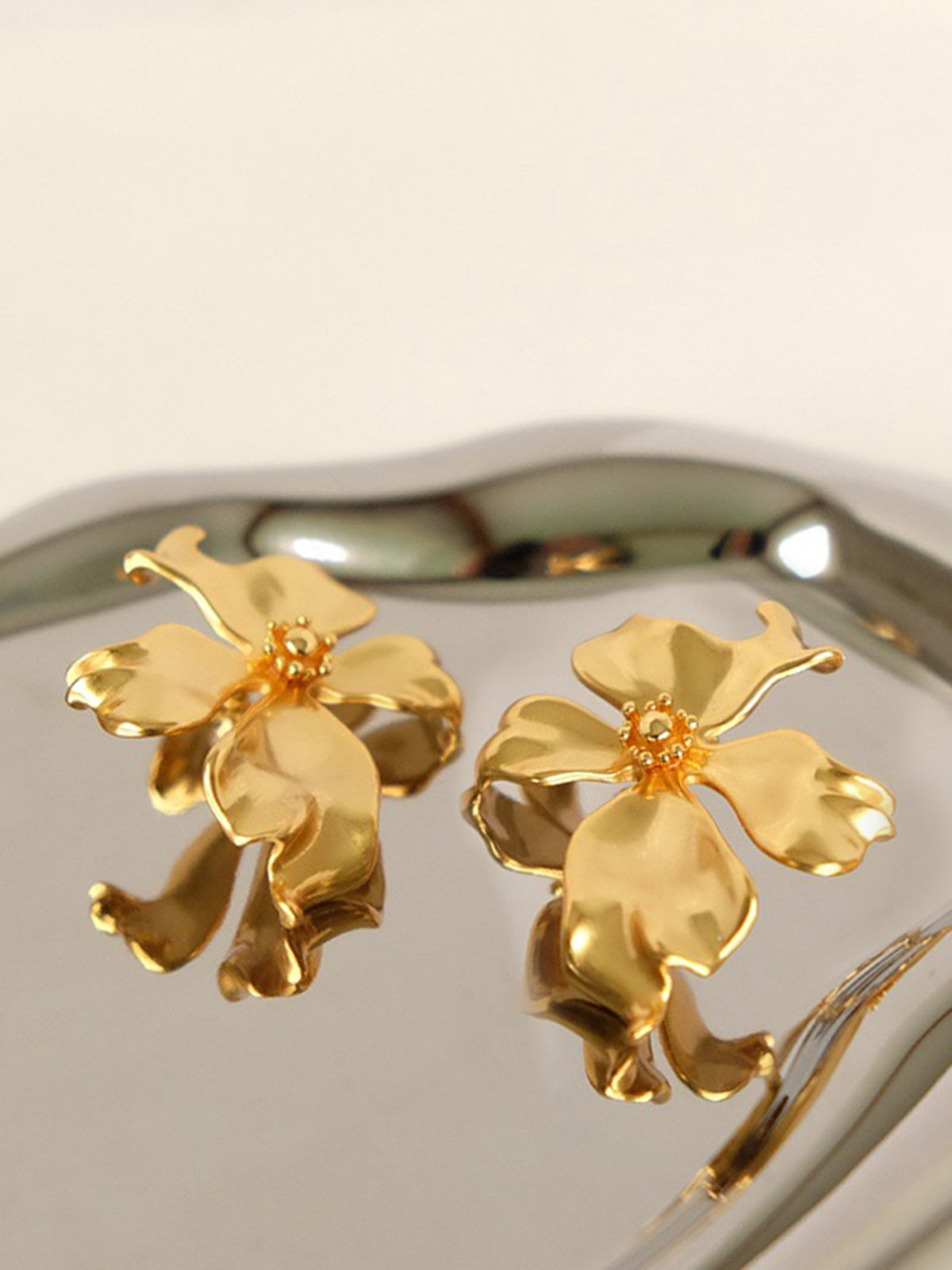Beautiful metal flower earrings for an elegant look