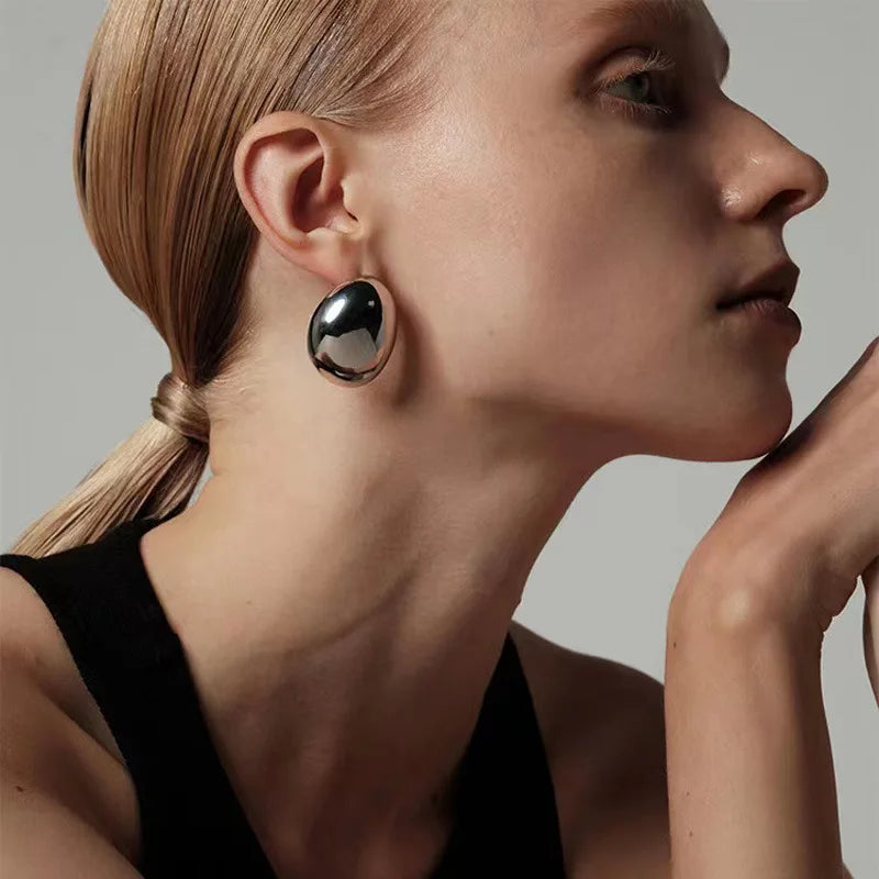 Oval Earrings with Gold, Rhodium, and Silver Plated Finish