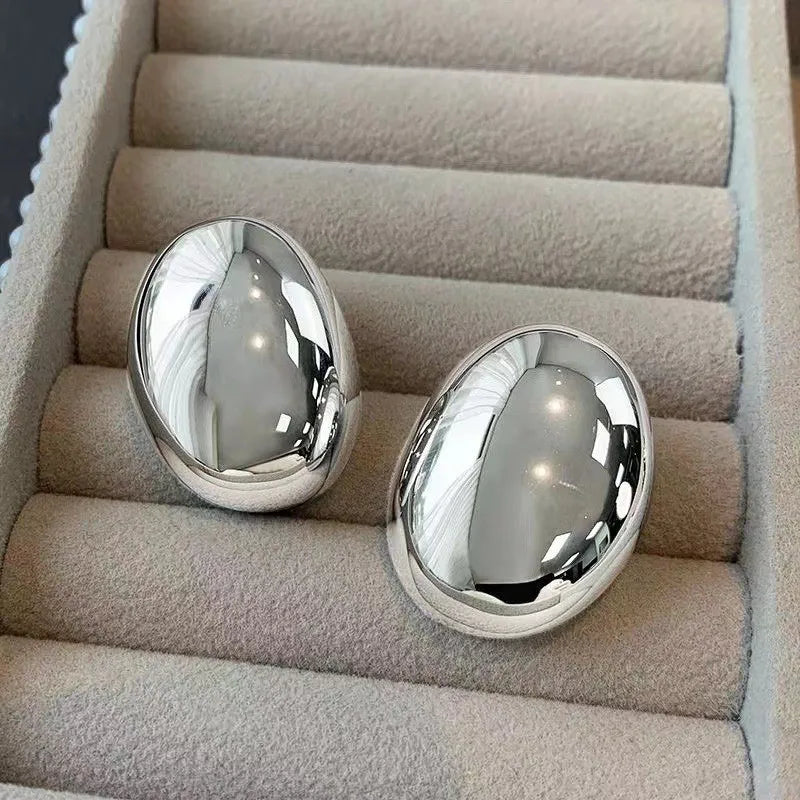 Oval Earrings with Gold, Rhodium, and Silver Plated Finish