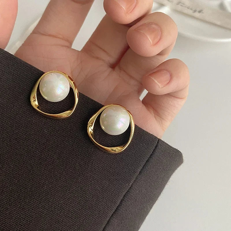 Captured Pearl Earrings in Gold Bezel