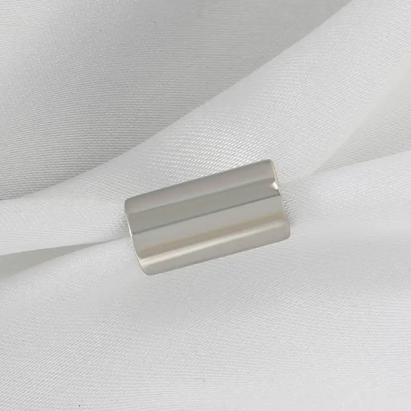 Cylindrical ear stud in tube form without piercing required