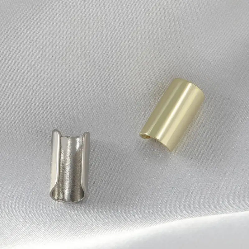 Cylindrical ear stud in tube form without piercing required