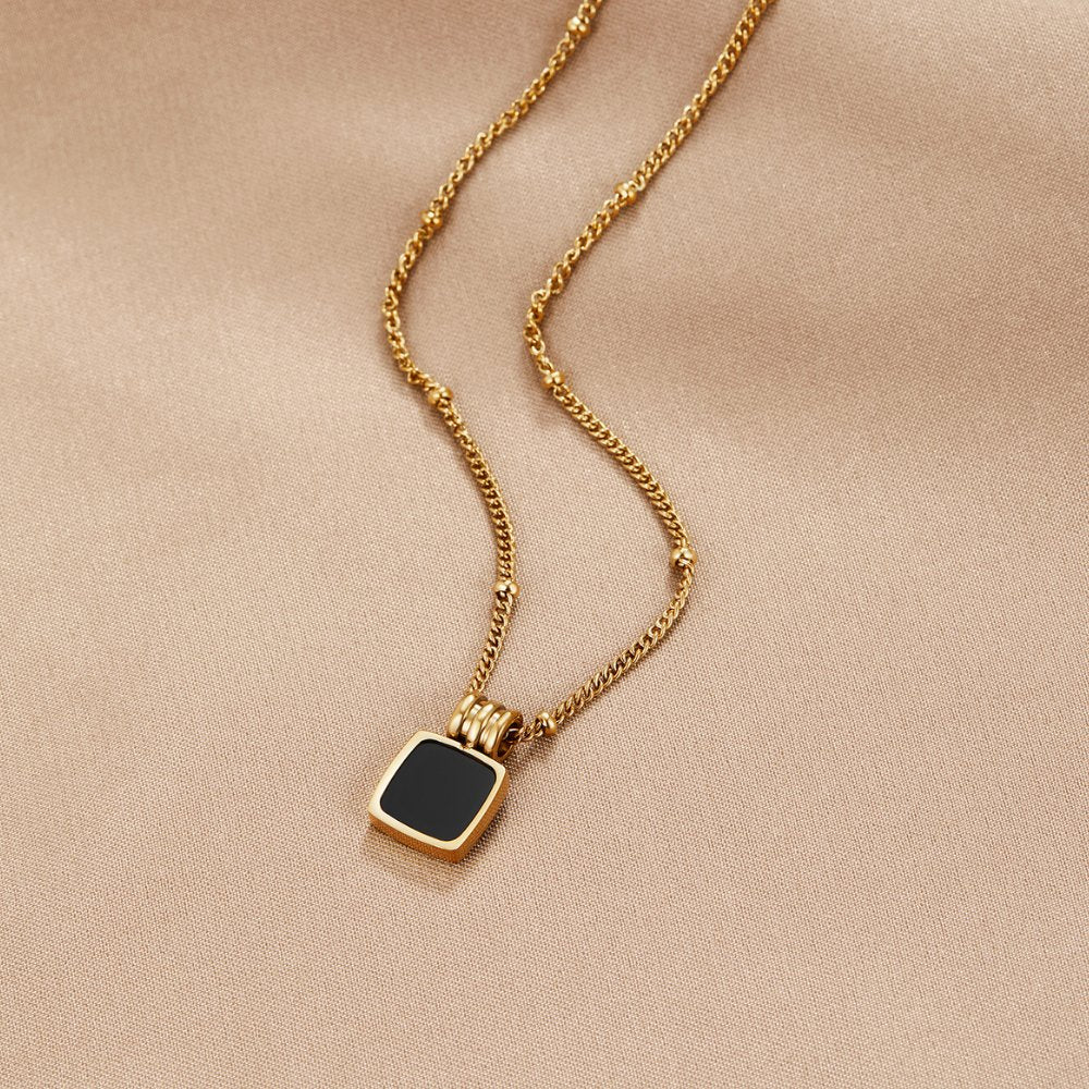 Elegant black necklace with a striking pendant