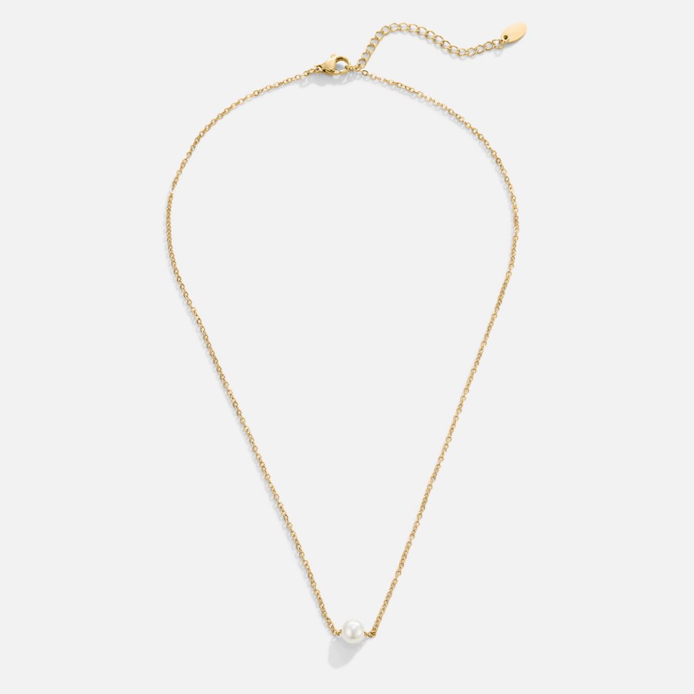 Elegant solitaire necklace with gold pearl - classic and style combined